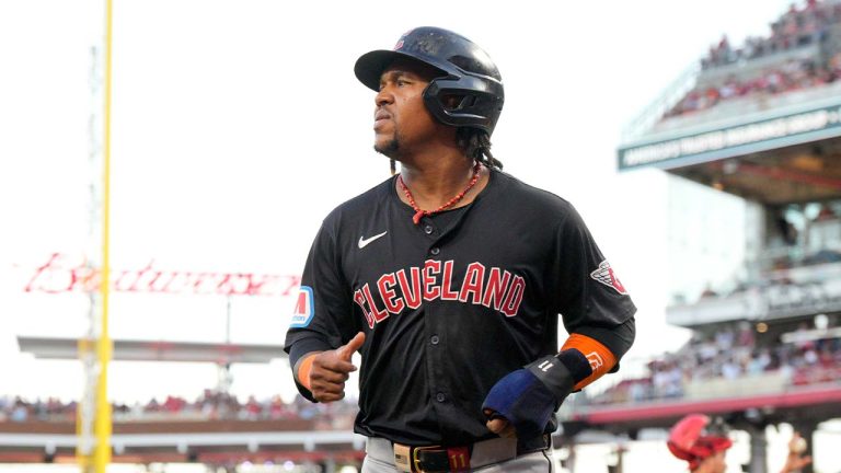 Cleveland Guardians' José Ramírez jogs to the dugout after scoring against the Cincinnati Reds during the fifth inning of a baseball game in Cincinnati, Wednesday, June 12, 2024. (Jeff Dean/AP)