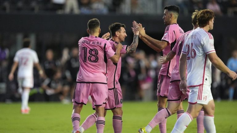 Inter Miami forward Lionel Messi celebrates his goal against St. Louis City with defender Jordi Alba and midfielder Sergio Busquets during the first half of an MLS soccer match Saturday, June 1, 2024, in Fort Lauderdale, Fla. (Rebecca Blackwell/AP Photo)