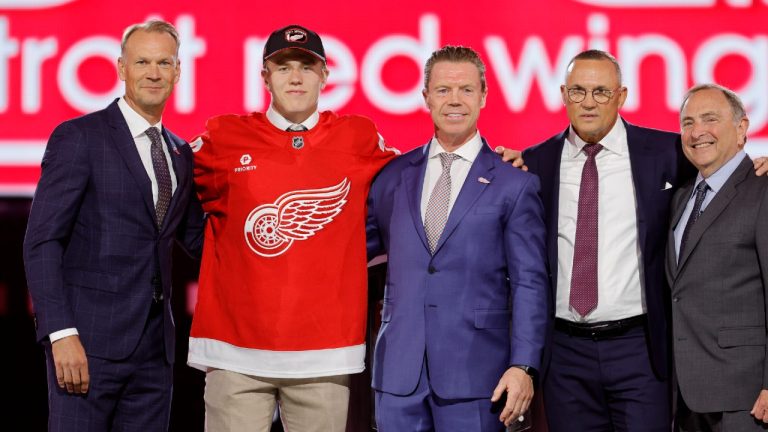 Michael Brandsegg-Nygard, second from left, poses after being selected by the Detroit Red Wings during the first round of the NHL hockey draft Friday, June 28, 2024, in Las Vegas. (Steve Marcus/AP)