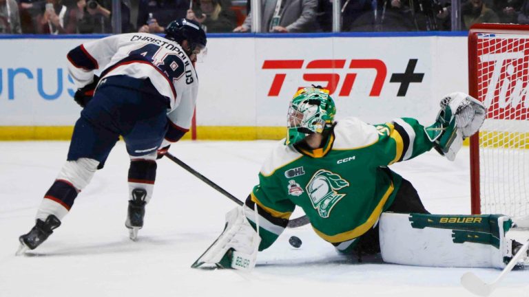 London Knights goalie Michael Simpson (31) stops a shot by Saginaw Spirit's Alex Christopoulos (48) during second period Memorial Cup hockey action in Saginaw, Mich., Wednesday, May 29, 2024. THE CANADIAN PRESS/Duane Burleson