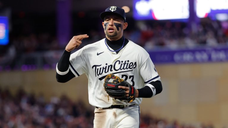 FILE - Minnesota Twins third baseman Royce Lewis runs off the field after throwing out Houston Astros' Jeremy Pena at first during the seventh inning of Game 4 of a baseball AL Division Series, Wednesday, Oct. 11, 2023, in Minneapolis. The Minnesota Twins reinstated third baseman Royce Lewis from the injured list on Tuesday, June 4, 2024, after a 58-game absence caused by a severely strained right quadriceps muscle. (Bruce Kluckhohn/AP)