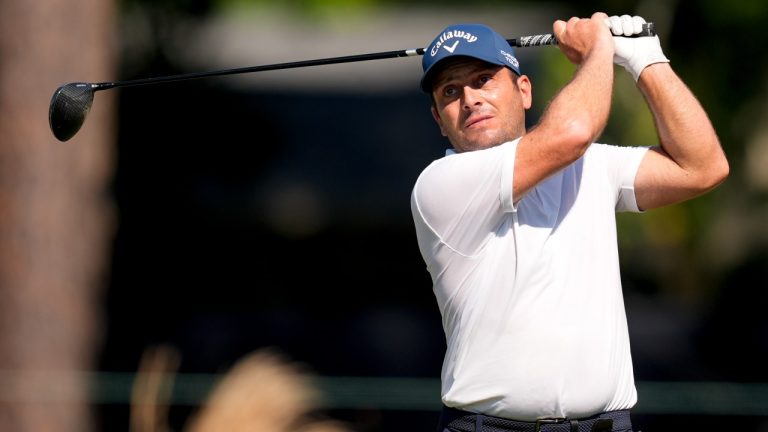 Francesco Molinari, of Italy, watches his tee shot on the seventh hole during a practice round for the U.S. Open golf tournament. (Mike Stewart/AP)
