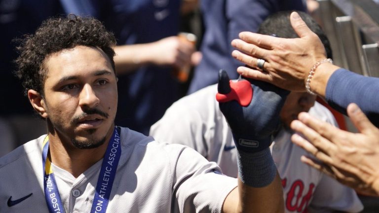 Boston Red Sox's David Hamilton celebrates with teammates after hitting a solo home run during the fifth inning of a baseball game against the Chicago White Sox in Chicago, Sunday, June 9, 2024. (Nam Y. Huh/AP Photo)