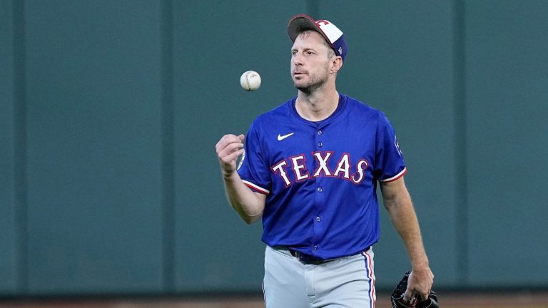 Texas Rangers starting pitcher Max Scherzer walks off the field after working out before a baseball game against the Houston Astros Friday, April 12, 2024, in Houston. (Kevin M. Cox/AP Photo)