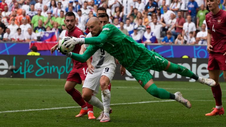 Serbia's goalkeeper Predrag Rajkovic makes a save during a Group C match between Slovenia and Serbia at the Euro 2024 soccer tournament in Munich, Germany, Thursday, June 20, 2024. (Antonio Calanni/AP)