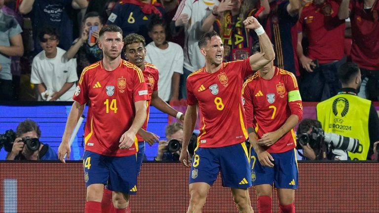 Spain's Fabian Ruiz (8) celebrates after scoring during a round of sixteen match between Spain and Georgia at the Euro 2024 soccer tournament in Cologne, Germany, Sunday, June 30, 2024. (Martin Meissner/AP)
