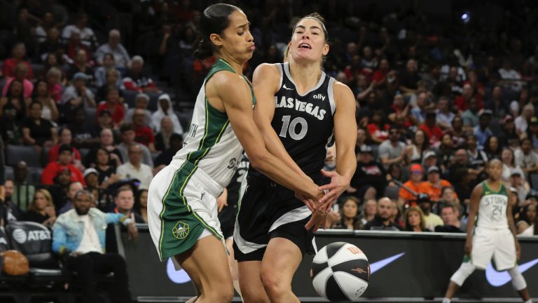 Seattle Storm guard Skylar Diggins-Smith knocks the ball away from Las Vegas Aces guard Kelsey Plum (10) during the first half of a WNBA basketball game in Las Vegas on Friday, June 7, 2024. (Steve Marcus/Las Vegas Sun via AP)