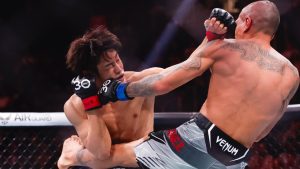 Tatsuro Taira, left, punches Edgar Chairez during a catchweight mixed martial arts bout at UFC 290 in Las Vegas. (Wade Vandervort/Las Vegas Sun via AP)