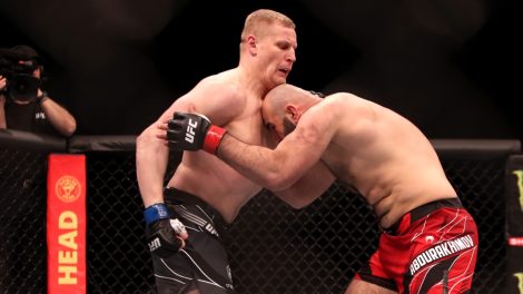 Sergei-Pavlovich-(left)-and-Shamil-Abdurakhimov-in-action-in-a-UFC-heavyweight-bout-at-The-O2,-London.