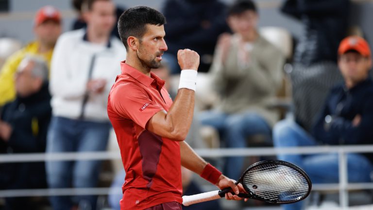 Serbia's Novak Djokovic clenches his fist after breaking the service game of Italy's Lorenzo Musetti in the fourth set of their third round match of the French Open tennis tournament at the Roland Garros stadium in Paris, Sunday, June 2, 2024. (Jean-Francois Badias/AP)