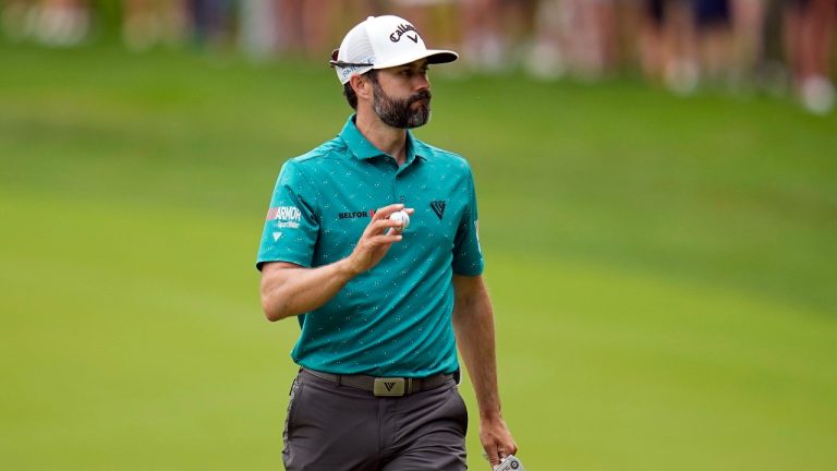 Adam Hadwin gestures after his putt on the second green in the third round of the Memorial golf tournament, Saturday, June 8, 2024, in Dublin, Ohio. (Sue Ogrocki/AP Photo)