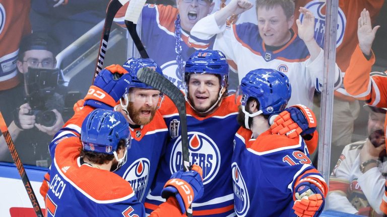 Edmonton Oilers' Mattias Janmark (13) celebrates his goal with teammates during the first period of Game 4 of the NHL hockey Stanley Cup final against the Florida Panthers in Edmonton, Saturday, June 15, 2024. (Jeff McIntosh/THE CANADIAN PRESS)