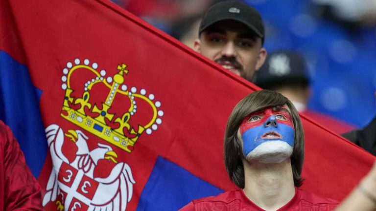 Serbia's fans chant ahead of a Group C match between Serbia and England at the Euro 2024 soccer tournament. (Andreea Alexandru/AP)