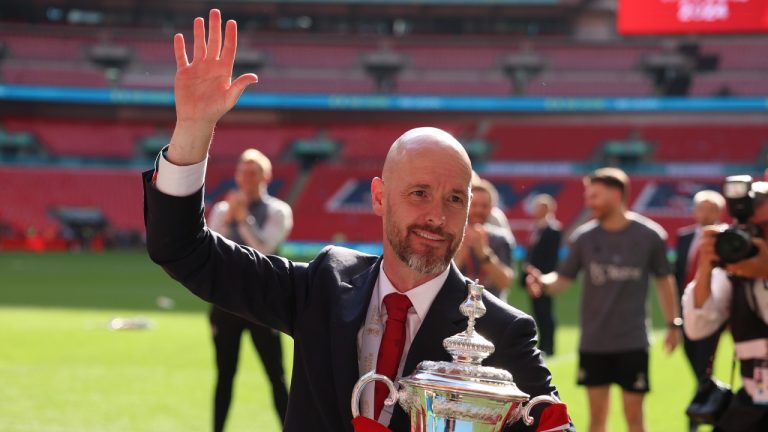 Manchester United's head coach Erik ten Hag celebrates with the trophy after winning the English FA Cup final soccer match between Manchester City and Manchester United at Wembley Stadium in London, Saturday, May 25, 2024. (Ian Walton/AP)