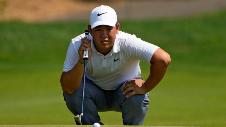 Tom Kim, of South Korea, lines up a putt on the 15th hole during the first round of the Travelers Championship golf tournament at TPC River Highlands, Thursday, June 20, 2024, in Cromwell, Conn. (Seth Wenig/AP)