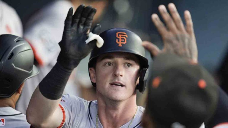 San Francisco Giants' Tyler Fitzgerald celebrates in the dugout after his solo home run during the second inning of a baseball game against the Los Angeles Dodgers, Tuesday, July 23, 2024, in Los Angeles. (Marcio Jose Sanchez/AP)