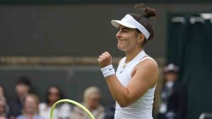 Bianca Andreescu of Canada reacts after winning a point against Linda Noskova of the Czech Republic during their match on day three at the Wimbledon tennis championships in London, Wednesday, July 3, 2024. THE CANADIAN PRESS/AP/Kirsty Wigglesworth