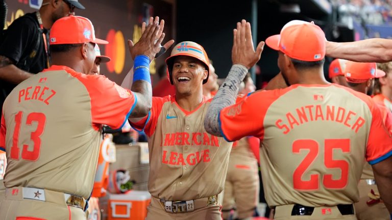 American League's Juan Soto, of the New York Yankees, celebrates after scoring on single from David Fry, of the Cleveland Guardians, during the third inning in the MLB All-Star baseball game, Tuesday, July 16, 2024, in Arlington, Texas. (Julio Cortez/AP)