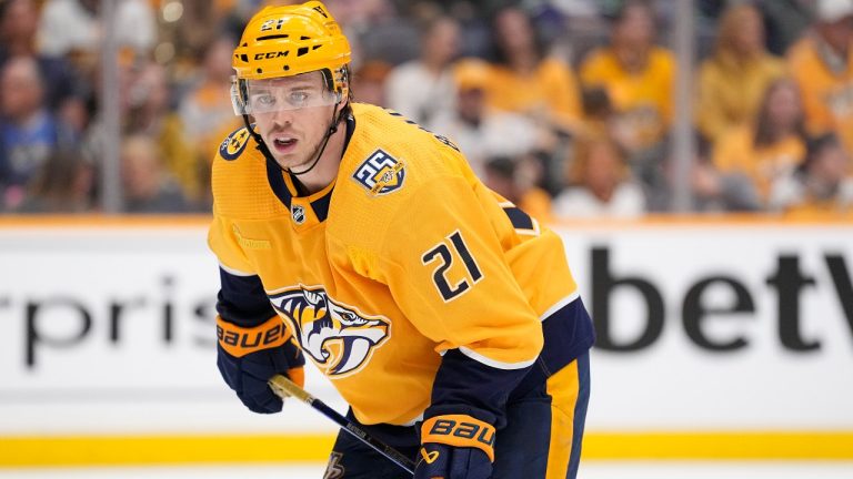 Nashville Predators left wing Anthony Beauvillier (21) plays against the Vancouver Canucks during the second period in Game 4 of an NHL hockey Stanley Cup first-round playoff series Sunday, April 28, 2024, in Nashville, Tenn. (George Walker IV/AP)