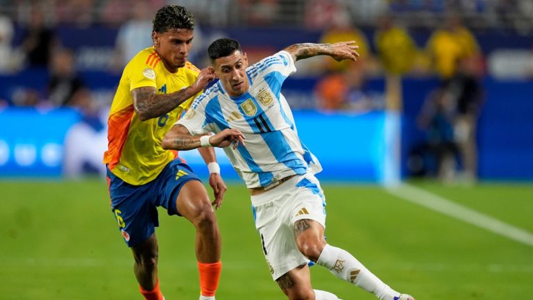 Argentina's Angel Di Maria and Colombia's Richard Rios battle for the ball during the Copa America final soccer match in Miami Gardens, Fla., Sunday, July 14, 2024. (Rebecca Blackwell/AP Photo)