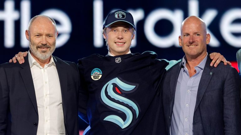 Berkly Catton poses after being selected by the Seattle Kraken during the first round of the NHL draft, June 28, 2024. (AP Photo/Steve Marcus)