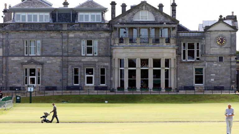 FILE - This July 7, 2010 file photo shows a view of the clubhouse at the end of the fairway on the first hole on the Old course at St Andrews golf course in St Andrews, Scotland. Wednesday, July 7, 2010.  (Scott Heppell/AP) 