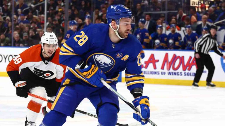 Buffalo Sabres left wing Zemgus Girgensons (28) carries the puck past Philadelphia Flyers center Morgan Frost (48) during the first period of an NHL hockey game Friday, April 5, 2024, in Buffalo, N.Y. (Jeffrey T. Barnes/AP)