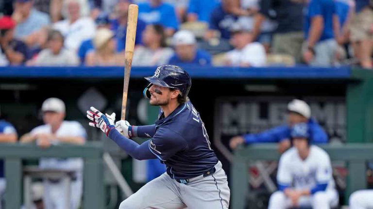 Tampa Bay Rays' Josh Lowe watches his RBI double during the first inning of a baseball game against the Kansas City Royals Thursday, July 4, 2024, in Kansas City, Mo. (Charlie Riedel/AP)
