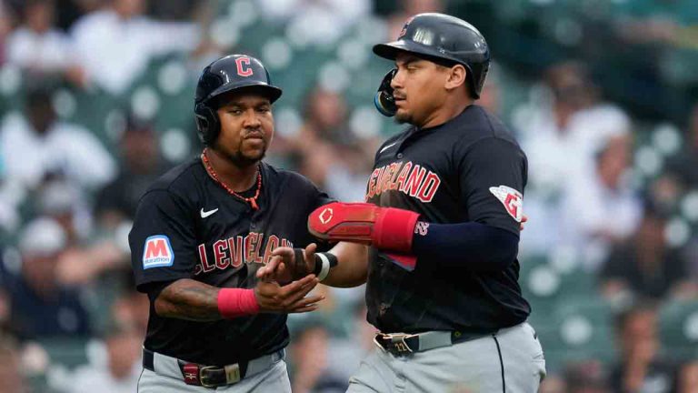 Cleveland Guardians' José Ramírez, left, and Josh Naylor celebrate scoring against the Detroit Tigers in the third inning of a baseball game, Tuesday, July 9, 2024, in Detroit. (Paul Sancya/AP)