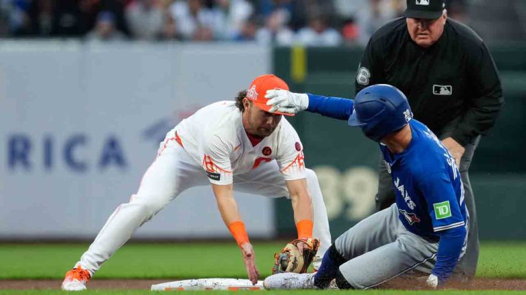Toronto Blue Jays' Ernie Clement, bottom right, is tagged out by San Francisco Giants shortstop Brett Wisely, left, while attempting to steal second base during the fifth inning of a baseball game Tuesday, July 9, 2024, in San Francisco. (Godofredo A. Vásquez/AP)
