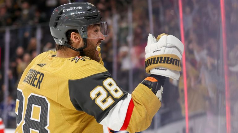 Vegas Golden Knights left wing William Carrier (28) celebrates after center Brett Howden, not pictured, scores a goal against the Tampa Bay Lightning during the second period of an NHL hockey game Tuesday, March 19, 2024, in Las Vegas. (Ian Maule/AP Photo)