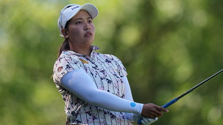 Chanettee Wannasaen, of Thailand, plays on the 2nd hole during the last round of the Evian Championship tournament, July 14, 2024. (AP Photo/Laurent Cipriani)