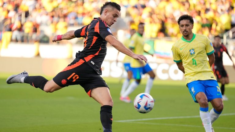 Colombia's Rafael Santos Borre prepares to shot as Brazil's Marquinhos defends during a Copa America Group D soccer match in Santa Clara, Calif., Tuesday, July 2, 2024. (AP Photo/Tony Avelar)