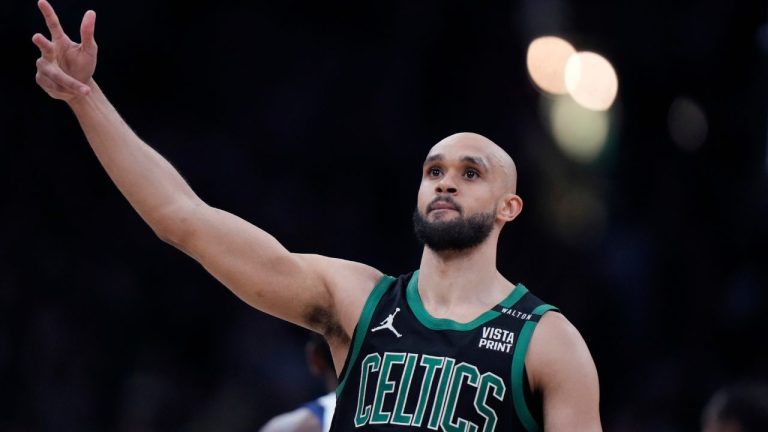 Boston Celtics guard Derrick White celebrates after hitting a 3-pointer against the Dallas Mavericks during the second half of Game 2 of the NBA Finals basketball series, Sunday, June 9, 2024, in Boston. (Steven Senne/AP Photo)