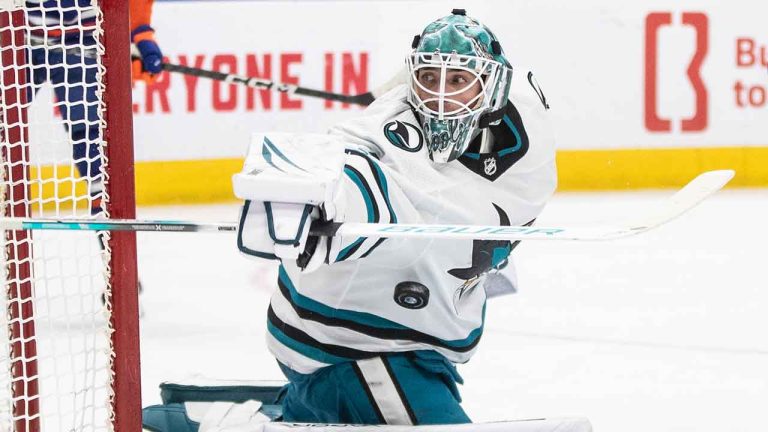 San Jose Sharks goalie Devin Cooley (1) makes the save against the Edmonton Oilers during second period NHL action in Edmonton. (Jason Franson/THE CANADIAN PRESS)