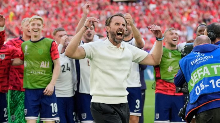England's manager Gareth Southgate and his players celebrate their victory after a quarterfinal match between England and Switzerland at the Euro 2024 tournament in Duesseldorf, Germany, July 6, 2024. (AP Photo/Martin Meissner)