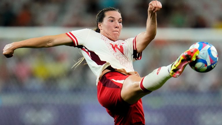 Canada's Vanessa Gilles reaches for the ball during a women's Group A soccer match between Colombia and Canada, at the 2024 Summer Olympics, Wednesday, July 31, 2024, at the Nice Stadium in Nice, France. (Julio Cortez/AP)