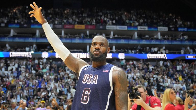 United States' forward LeBron James waves to the crowd after the end of an exhibition basketball game between the United States and South Sudan, at the o2 Arena in London, Saturday, July 20, 2024. (AP Photo/Kin Cheung)