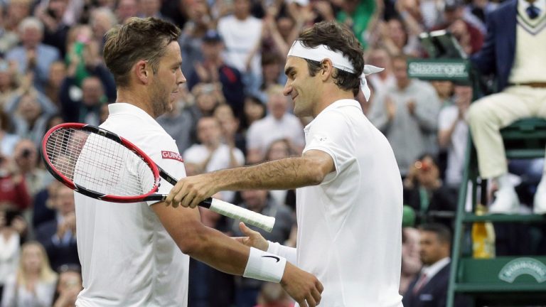 Roger Federer, of Switzerland, right, shakes hands with Marcus Willis, of Britain, after Federer beat Willis in their men's singles match of the Wimbledon Tennis Championships in London, June 29, 2016.  (AP Photo/Tim Ireland, File)