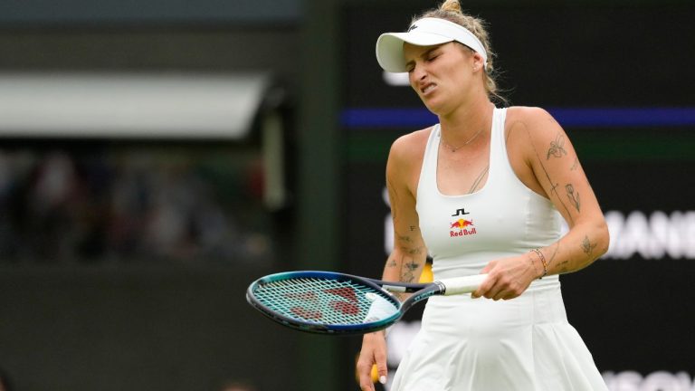 Marketa Vondrousova of the Czech Republic reacts during her first round match against Jessica Bouzas Maneiro of Spain at the Wimbledon tennis championships in London, Tuesday, July 2, 2024. (Kirsty Wigglesworth/AP Photo)