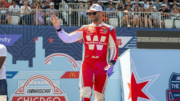 Shane Van Gisbergen (97) greets fans during the driver introduction before a NASCAR Xfinity Series street course auto race in Grant Park, Saturday, July 6, 202 4 in Chicago. (Tyler Pasciak LaRiviere/AP)