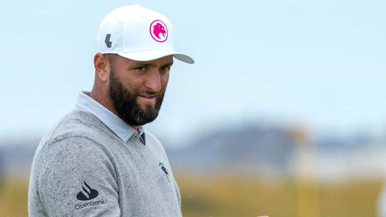 Jon Rahm of Spain prepares to putt during a practice round ahead of the British Open Golf Championships at Royal Troon golf club in Troon, Scotland, Tuesday, July 16, 2024. (Jon Super/AP)