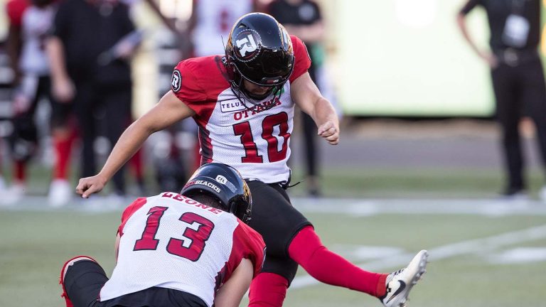 Ottawa Redblacks' Lewis Ward (10) makes the field goal for the win over the Edmonton Elks at the end of second half CFL action in Edmonton, Alta., on Sunday July 14, 2024. (Jason Franson/CP)
