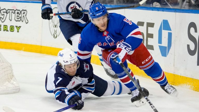 New York Rangers defenceman Chad Ruhwedel skates against Winnipeg Jets centre Vladislav Namestnikov during the first period of an NHL hockey game, Tuesday, March 19, 2024, at Madison Square Garden in New York. (Mary Altaffer/AP Photo)