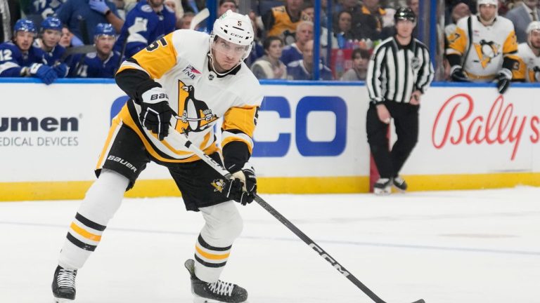 Pittsburgh Penguins defenceman Ryan Shea (5) against the Tampa Bay Lightning during the first period of an NHL hockey game Wednesday, Dec. 6, 2023, in Tampa, Fla. (Chris O'Meara/AP Photo)