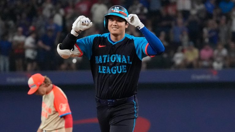 National League's Shohei Ohtani, of the Los Angeles Dodgers, runs the bases after hitting a three run homer during the MLB All-Star game, July 16, 2024. (AP Photo/LM Otero)