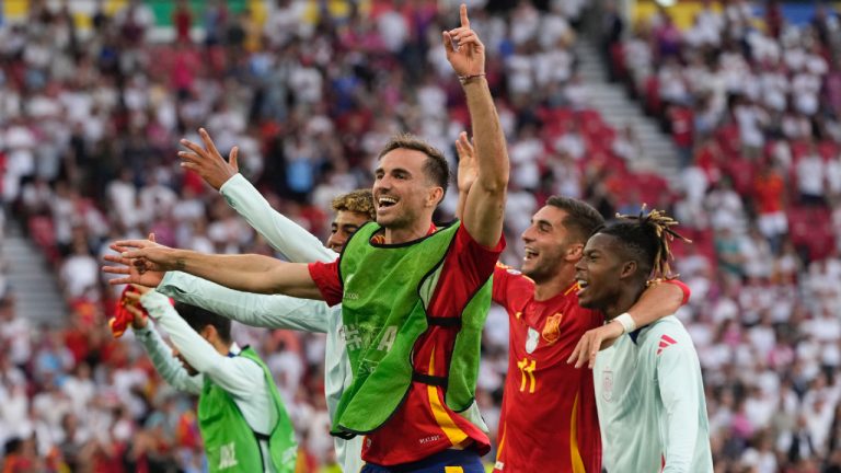 Spain players celebrate after a quarterfinal match between Germany and Spain at the Euro 2024 soccer tournament in Stuttgart, Germany, Friday, July 5, 2024. (Antonio Calanni/AP)