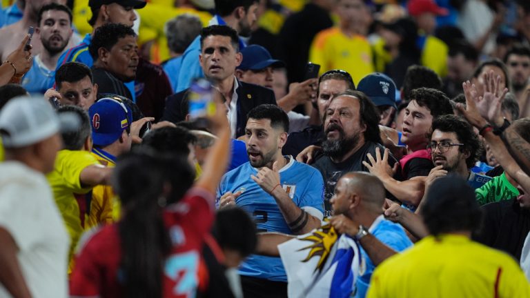 Uruguay's Jose Gimenez, centre, argues with fans at the end of a Copa America semifinal soccer match against Colombia in Charlotte, N.C., Wednesday, July 10, 2024. (Julia Nikhinson/AP)