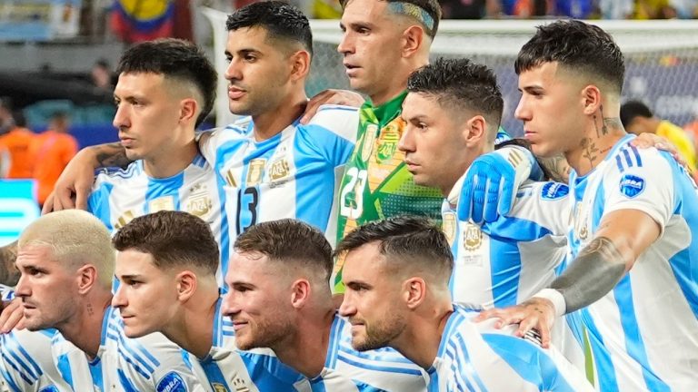 Players of Argentina pose for a team photo prior to their Copa America final soccer match against Colombia in Miami Gardens, Fla., Sunday, July 14, 2024. (Julio Cortez/AP Photo)