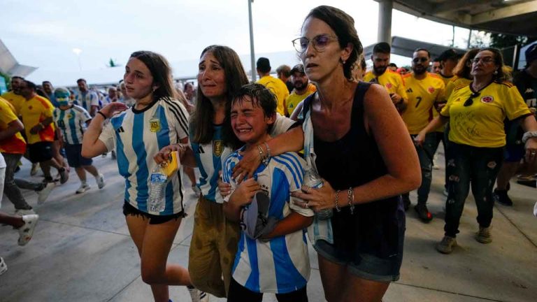Fans try to enter the stadium following delays to the Copa America final soccer match between Argentina and Colombia, in Miami. (Lynne Sladky/AP)